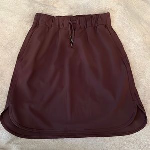Lululemon On the Fly Skirt, cherry Cola, size 6, BNWOT